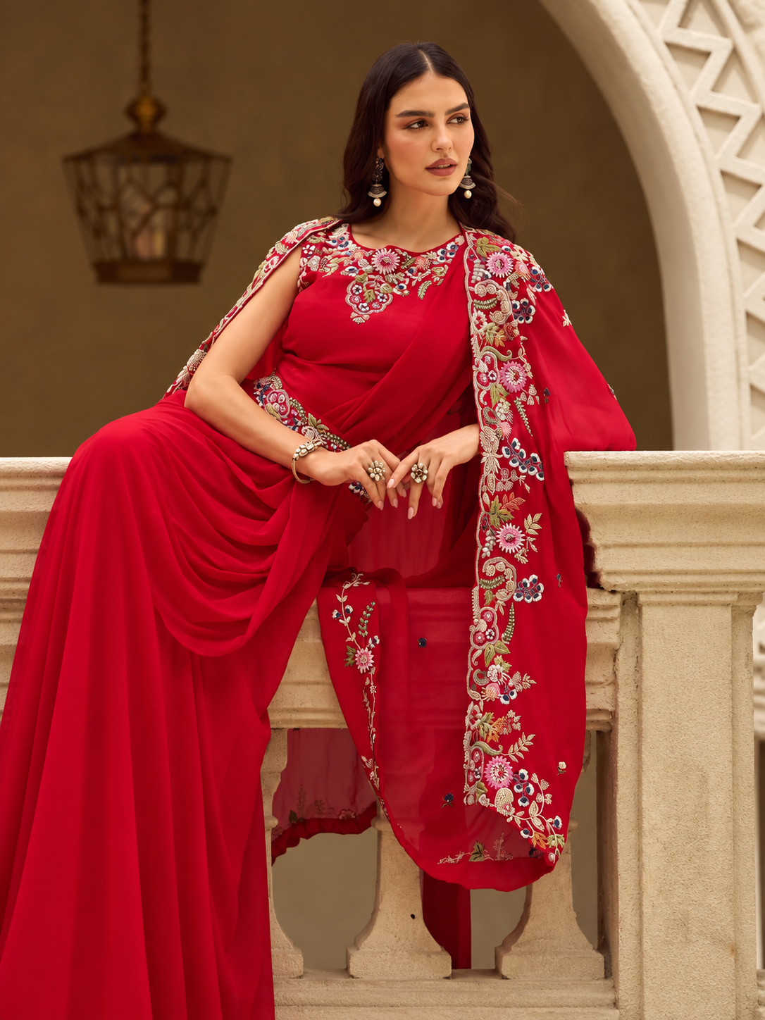 Red embroidered cape-style lehenga set full front view