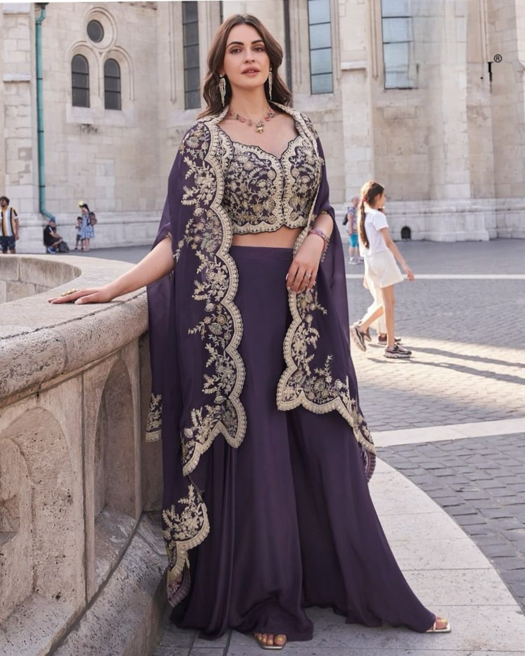 Close-up front view of the intricate gold embroidery on the purple crop top, highlighting the fine detailing and fabric texture for weddings and festive events