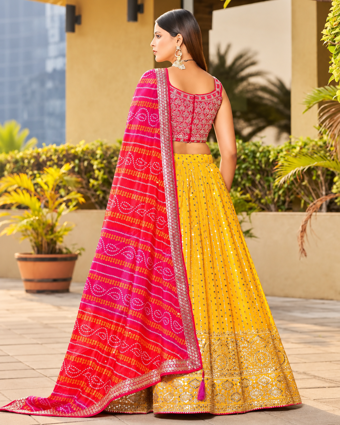 Yellow Georgette Embroidered Lehenga with Pink Mirror Work Blouse