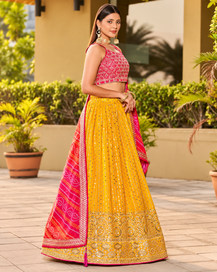 Yellow Georgette Embroidered Lehenga with Pink Mirror Work Blouse